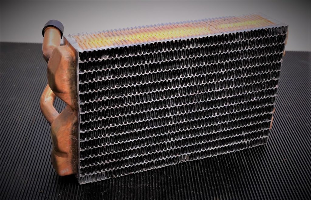 automotive heater core on a workbench
