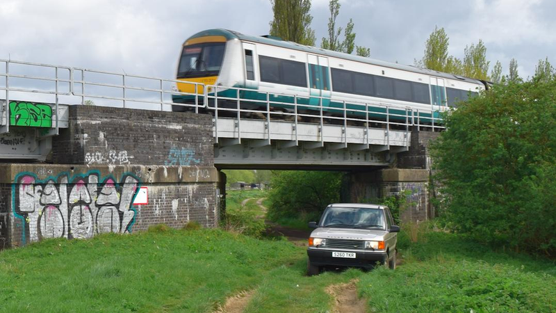 Off the rails: Range Rover vs train