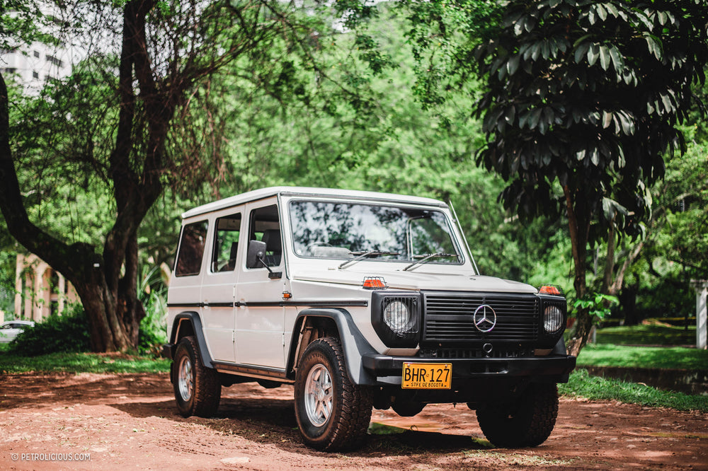 A Mercedes Station Wagon, G-Wagen, And A BMW Pickup Truck Share A Garage In Colombia
