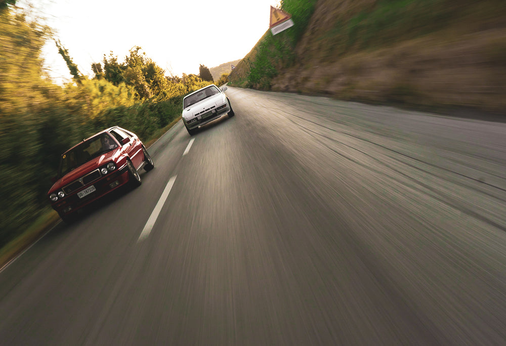 A Porsche 924 Turbo Meets A Lancia Delta Integrale On An Italian Backroad