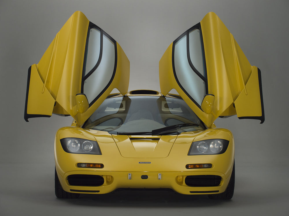 This Brand-New Dandelion Yellow McLaren F1 Still Wears Its Plastic Seat Covers