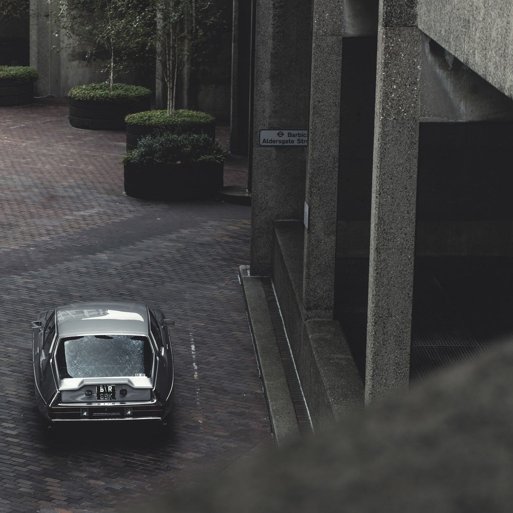 European Noir: A Citroën SM Skates Through The Shadows Of The Barbican Centre