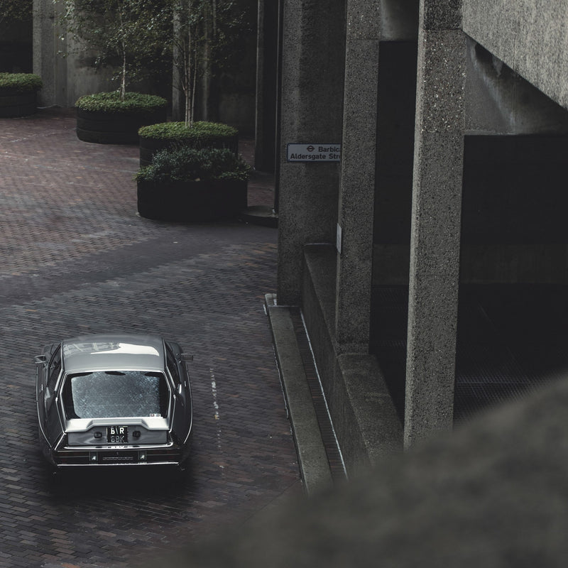 European Noir: A Citroën SM Skates Through The Shadows Of The Barbican Centre