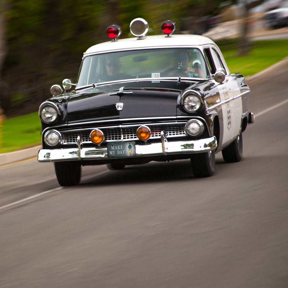 Grab a Dozen Donuts in this Original '55 Ford Police Car