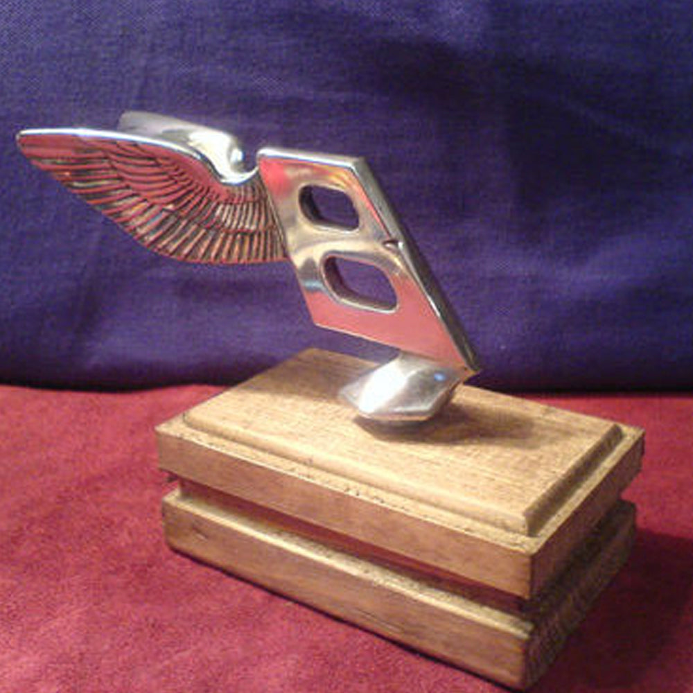 Hood Ornaments Bring Visual Heft to Your Desktop Paper Stack