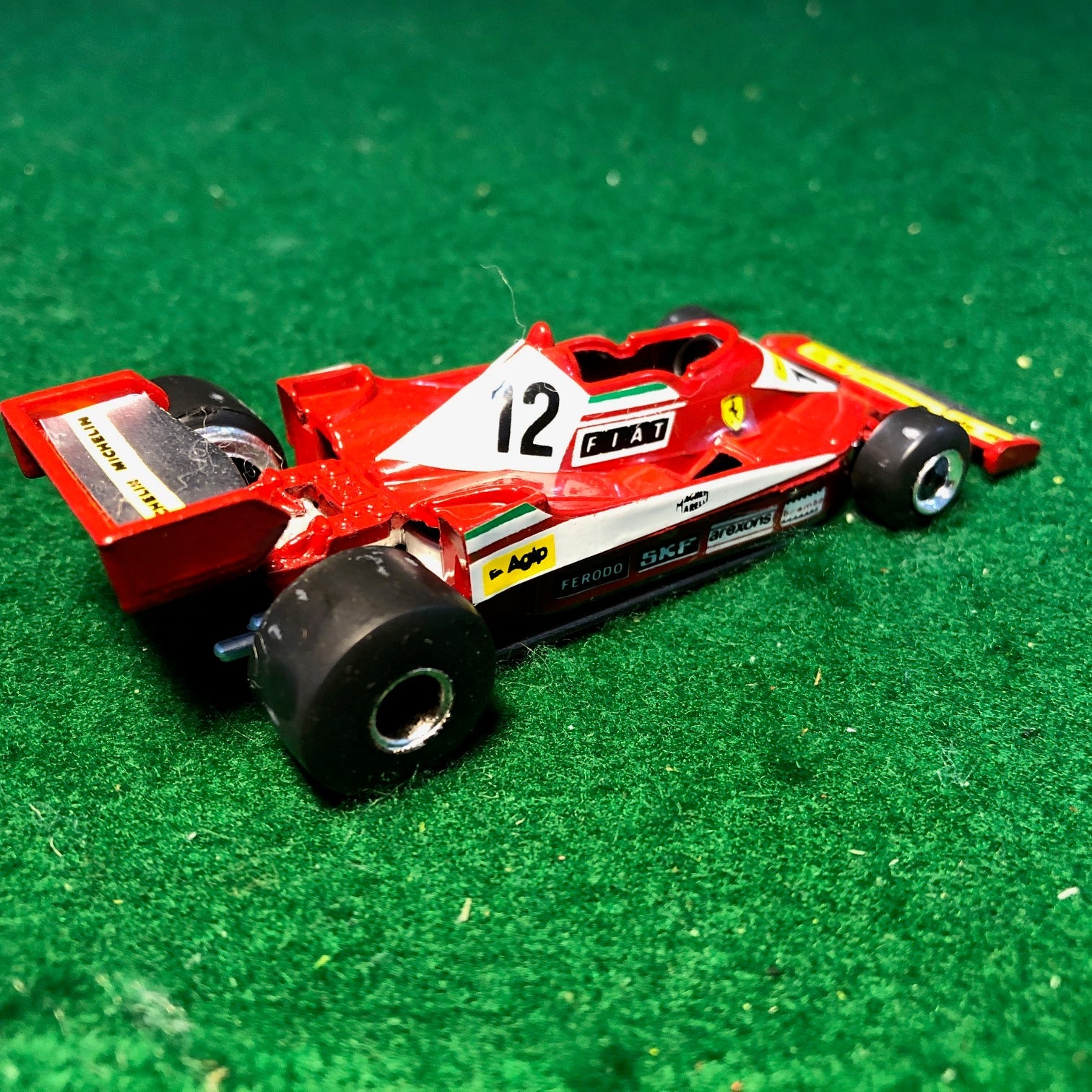 Ferrari 312 T3 N 12 Gilles Villeneuve by Yaxon 1:43 (0706)(No box)
