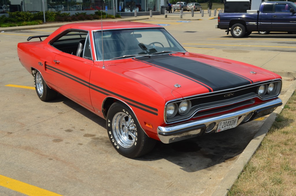 orange 1970 plymouth gtx coupe