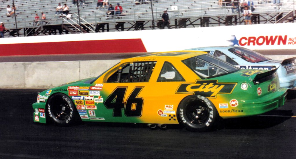 days of thunders car in city Chevrolet livery at drag race setting