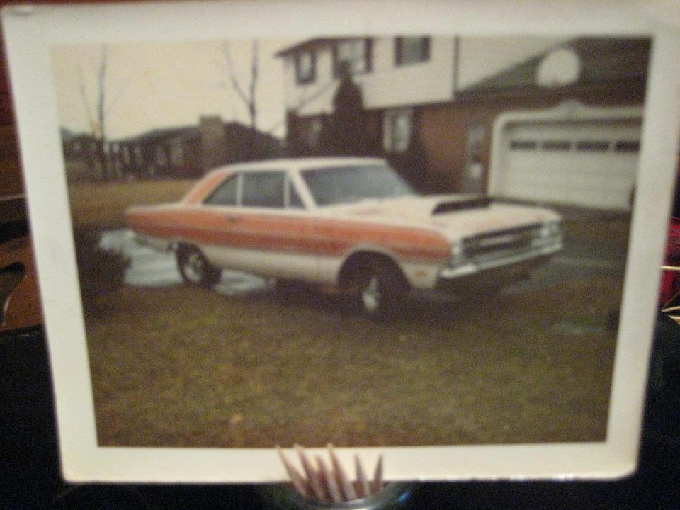 blurry picture of a vintage mopar muscle car