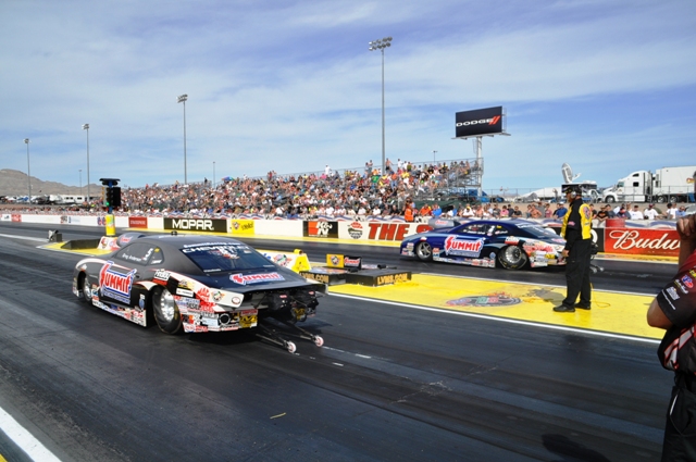 Summit Racing Pro Stock NHRA Camaros racing at track