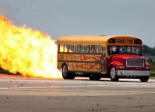 a jet powered school bus shooting flames