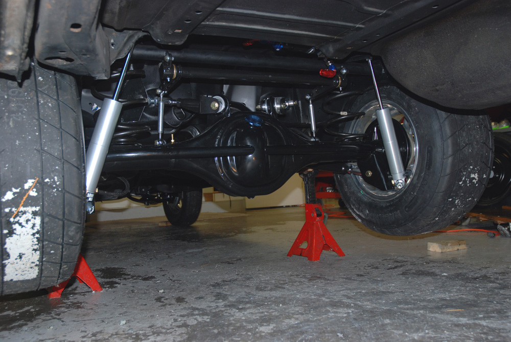 underside view at the rear suspension and chassis on a race car