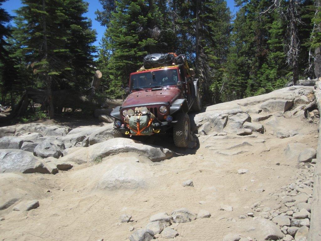 jeep wrangler jk crawling down desert trail