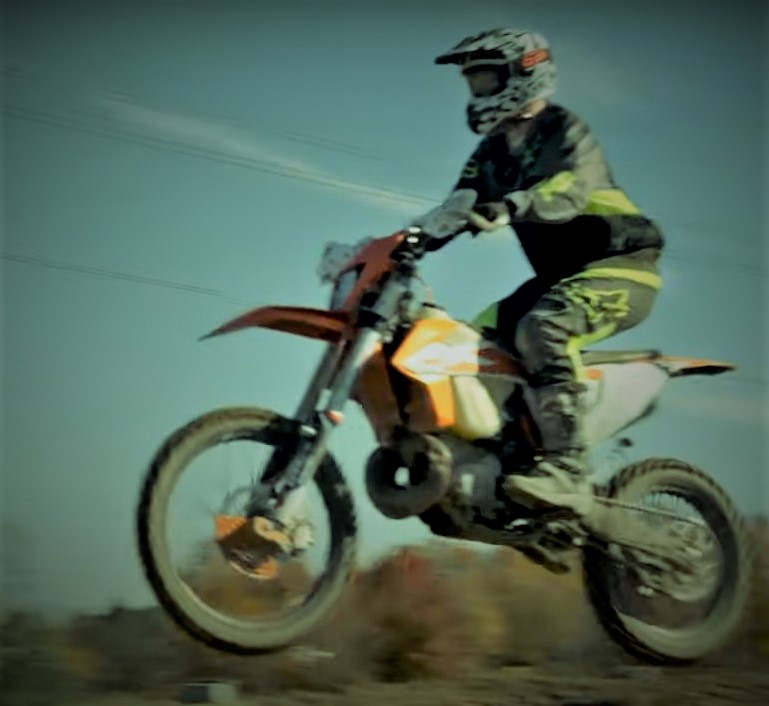 Man Jumping In a Dirt Bike