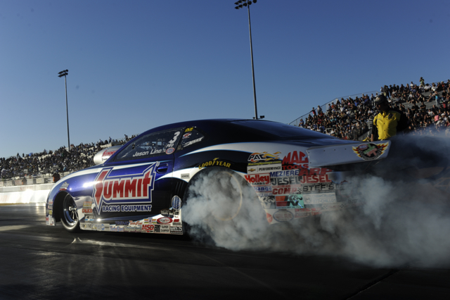 Jason Line doing a burnout at 2014 NHRA Sonoma race