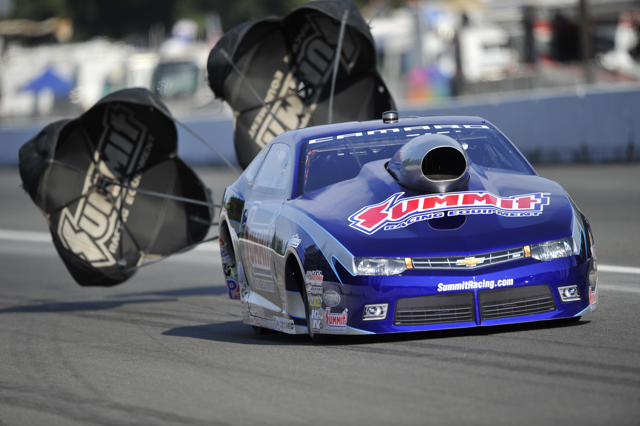 Jason Line nhra pro stock camaro at end of the run with parachutes deployed