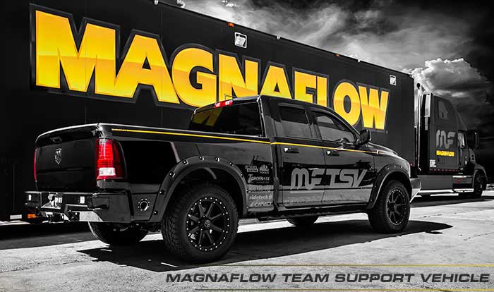 truck in front of magnaflow exhaust semi trailer