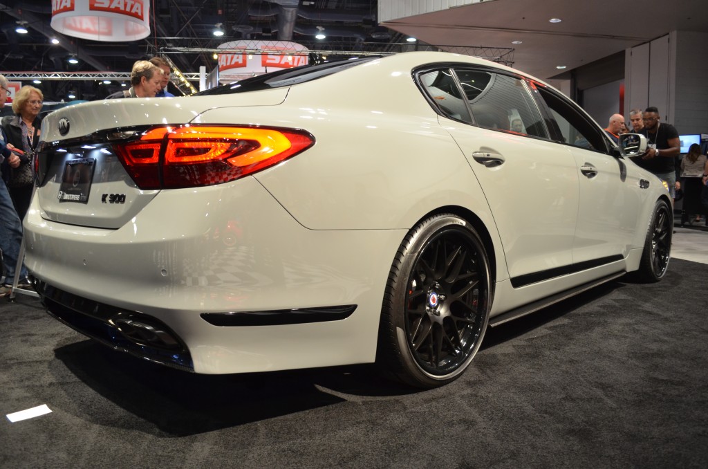 rear quarter view of a kia k900 on display at 2014 SEMA automotive trade show