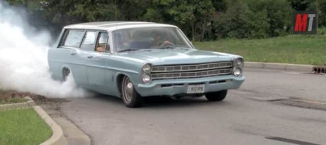 ford station wagon doing a burnout