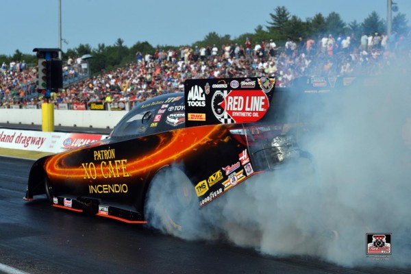 nhra funny car doing burnout in 2015