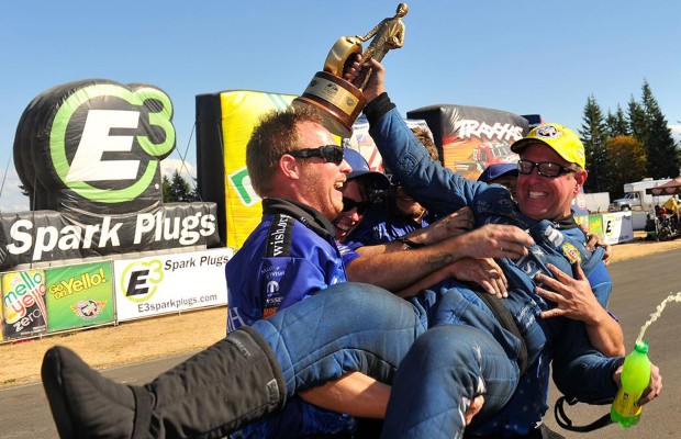 men celebrating an nhra race win