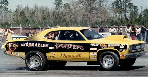 vintage photo of drag racer Akron Arlen Vanke in a plymouth duster