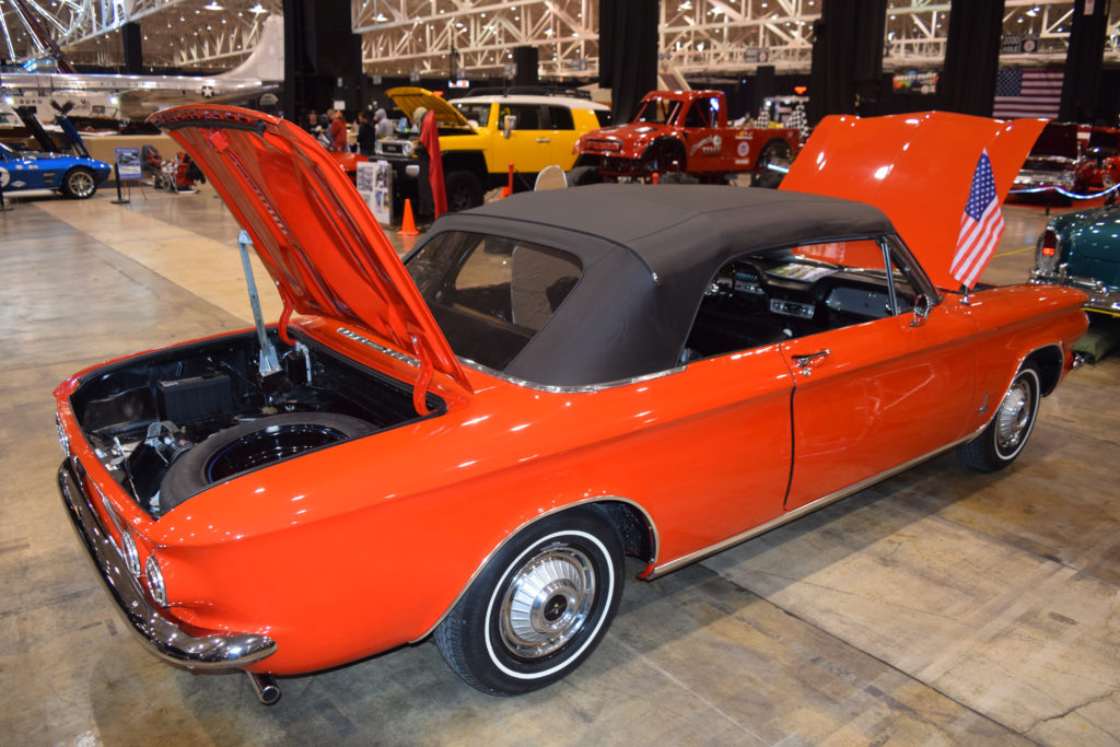 rear passenger side view of a chevy corvair convertible