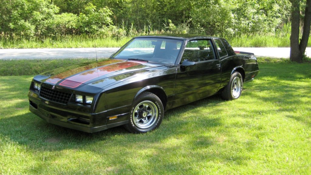 1986 chevy monte carlo ss parked on grass