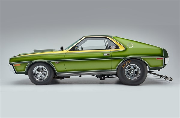 side profile shot of a green 1970 amc amx drag car