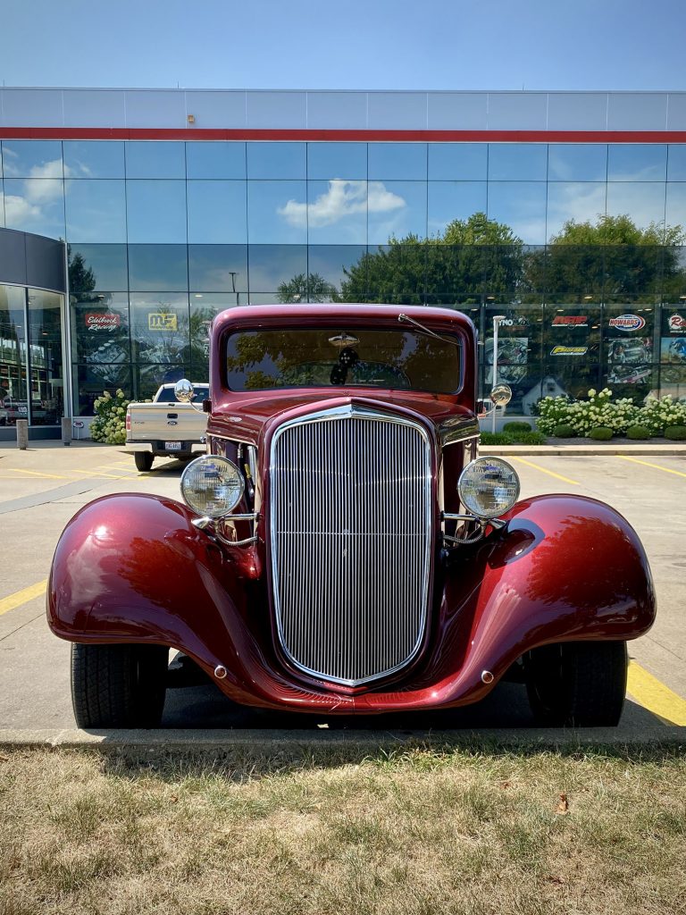 front grille shot of a 1934 red chevy hot rod