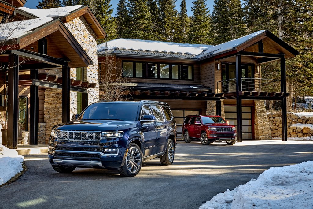 2022 wagoneer and grand wagoneer in press photo at ski lodge