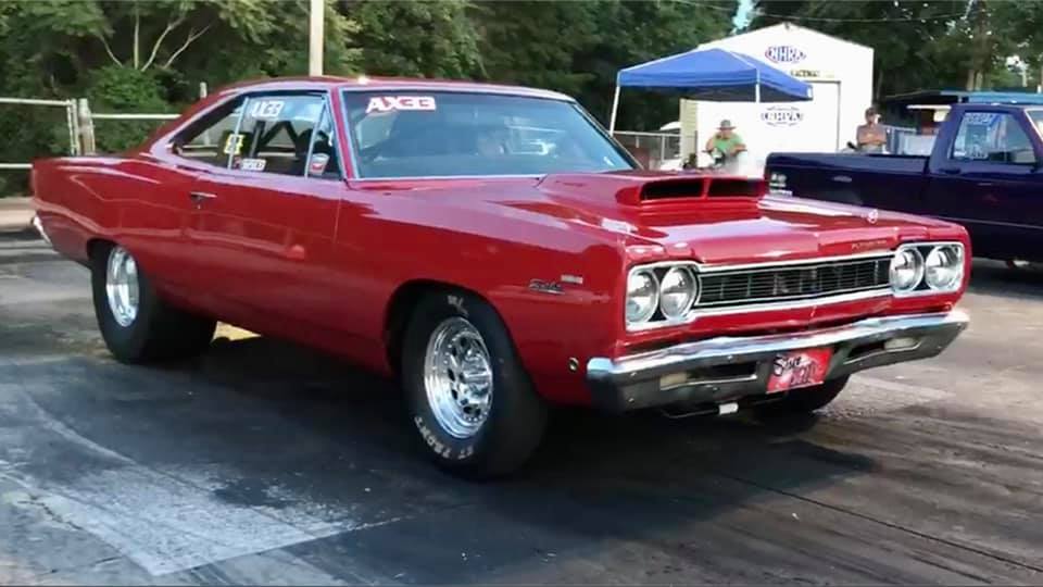 1968 plymouth sport satellite coupe stages at a drag strip