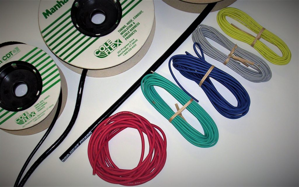 assortment of electrical wiring on white tabletop