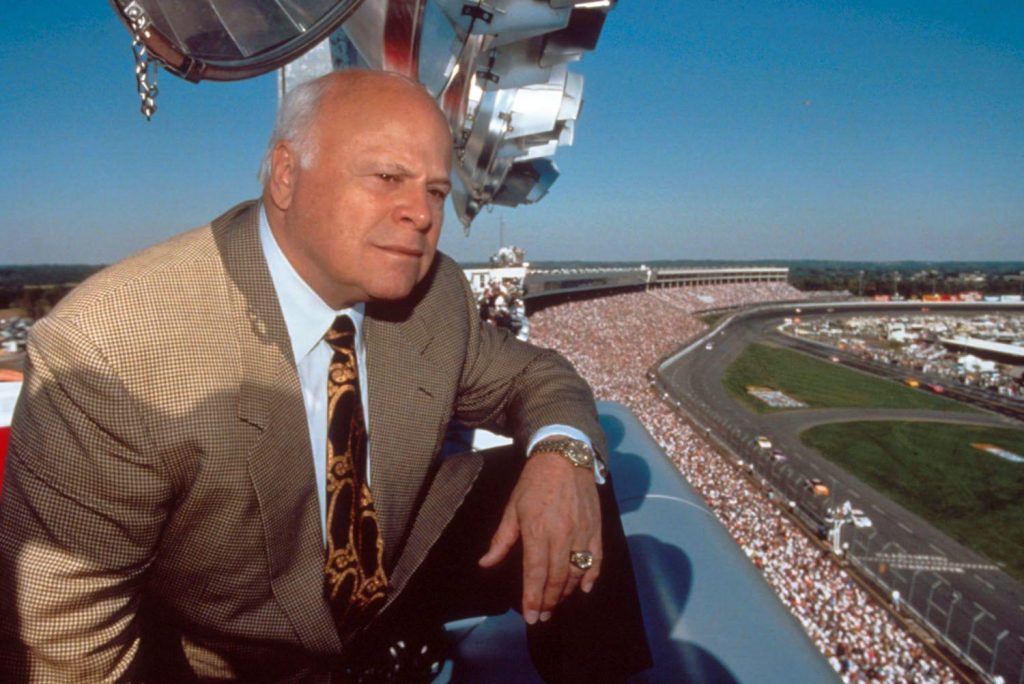 bruton smith overlooking a race track