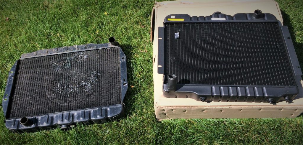 side by side comparison between old jeep cj 258 radiator and new one from summit racing