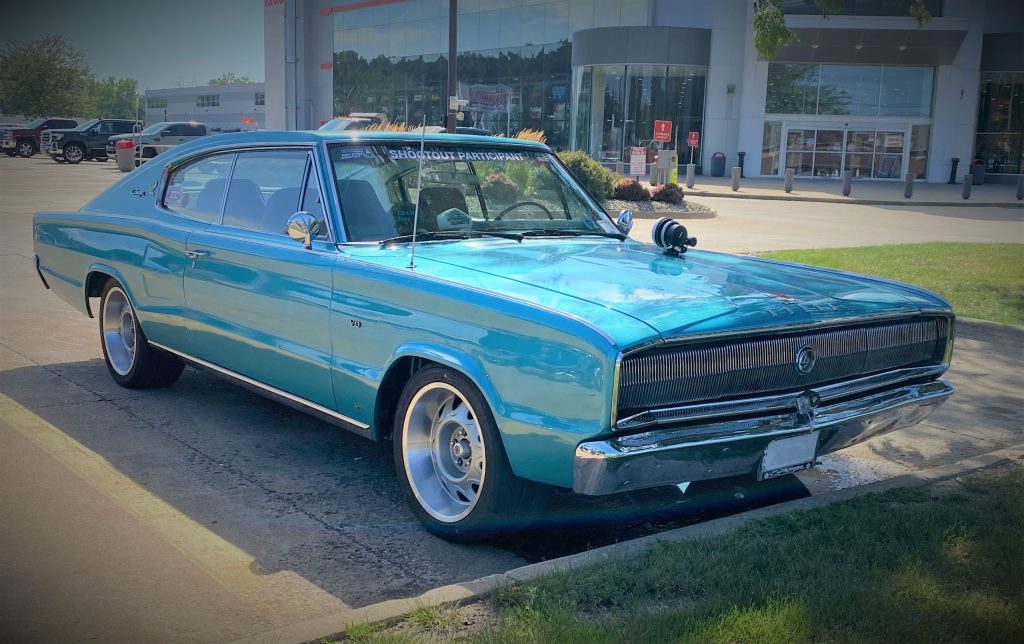 1966 dodge charger front grille parked in summit racing parking lot on a sunny day