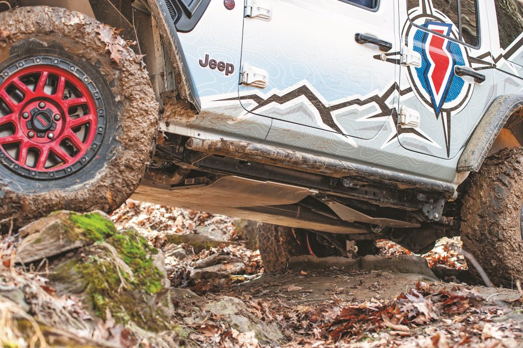 close up of jeep wrangler belly pan in mud trail