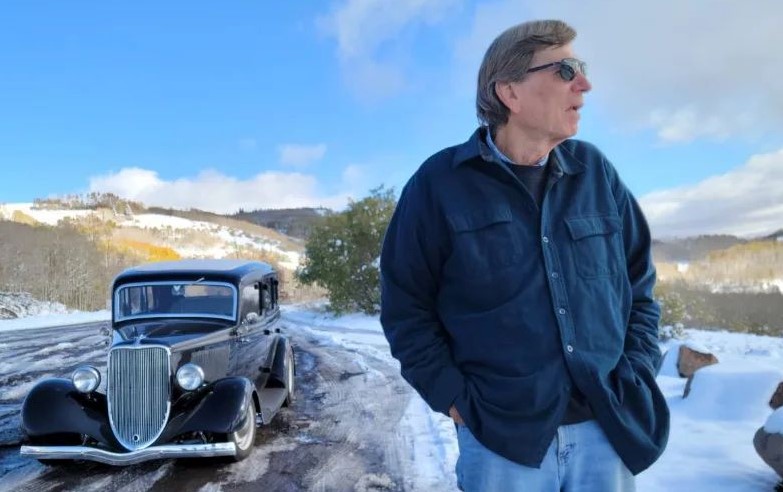 pat ganahl in front of hot rod