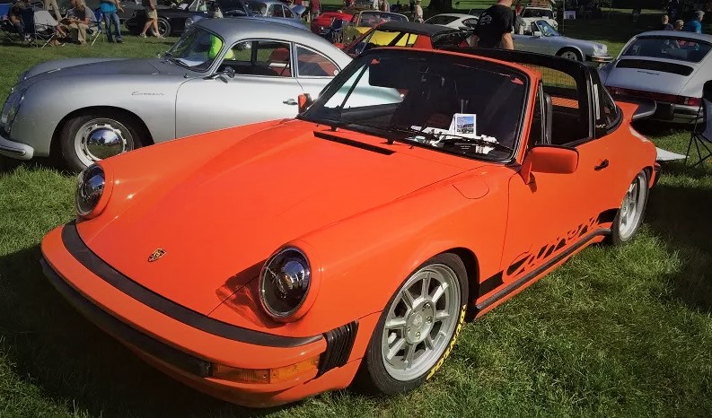 Red Porsche 911 air cooled carerra and 356 speedster at moto bella car show at stan hywet