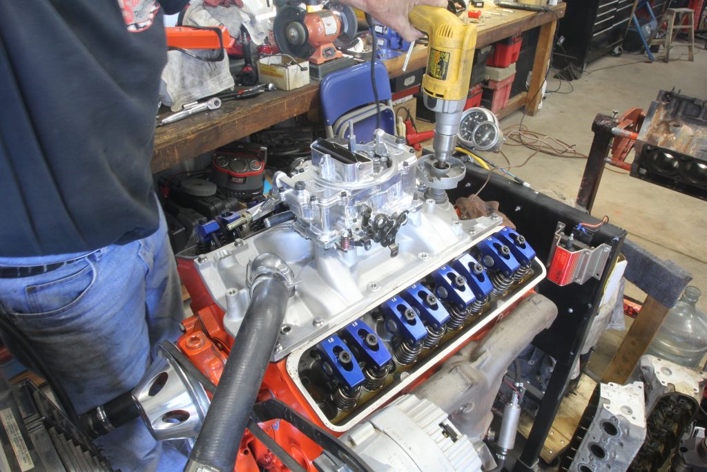 pressure lubing an engine with a hand drill on distributor shaft prior to initial start up
