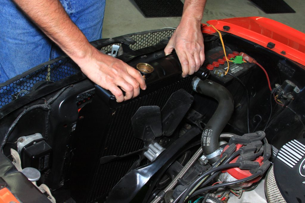 installing a new radiator into a vintage ford mustang