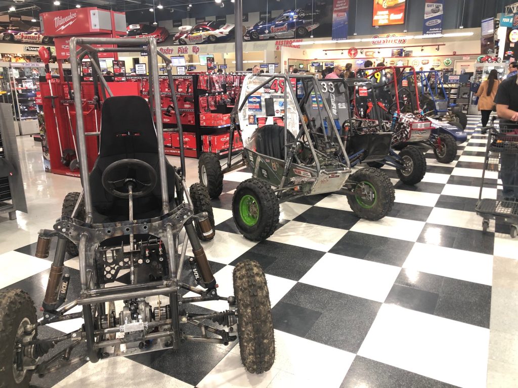 Formula SAE and Baja SAE vehicles on display at Summit Racing retail store