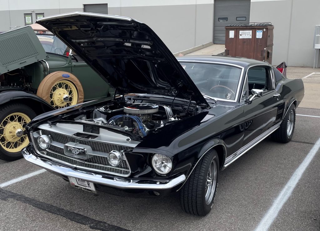 black 1967 ford mustang fastback coupe with a 302 V8