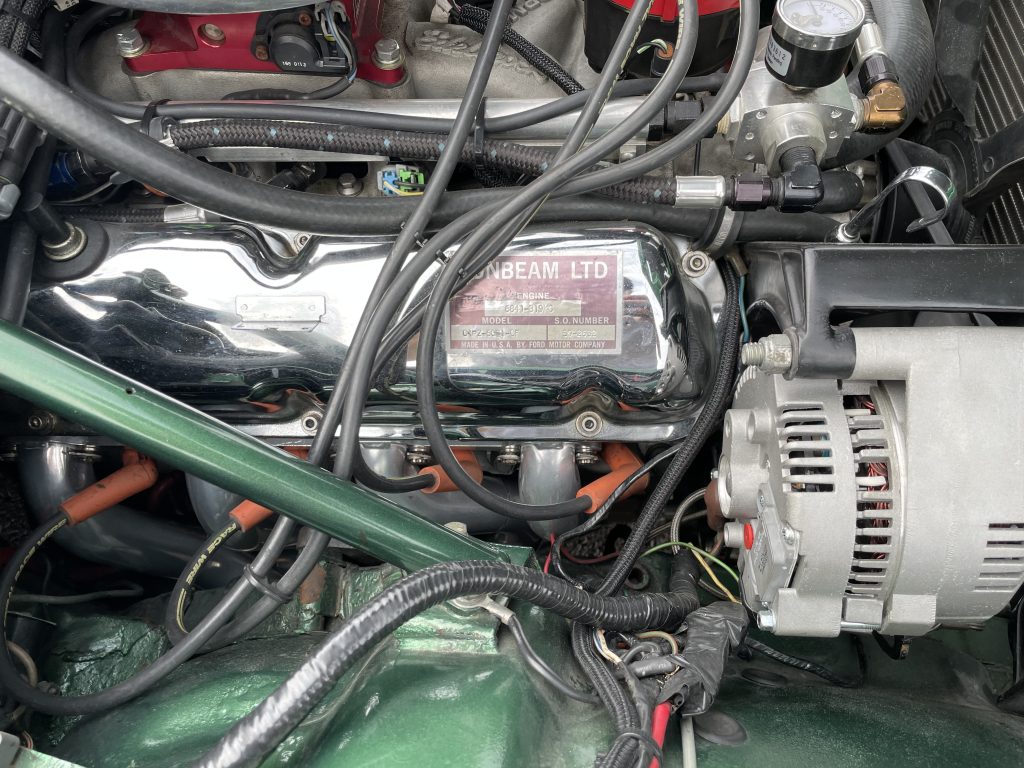 chrome sunbeam valve covers on a ford racing aluminum block v8 in a tiger