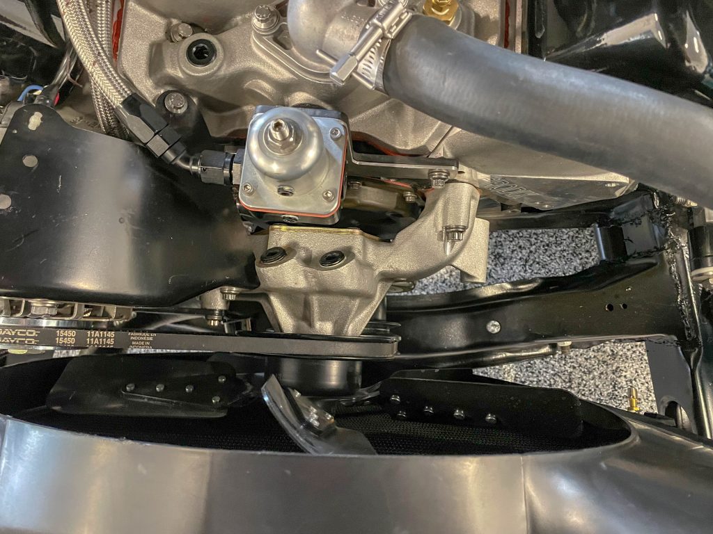 close up of water pump and fan on a v8 chevy engine