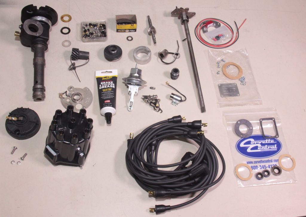 delco distributor an rebuild parts laid out on a table
