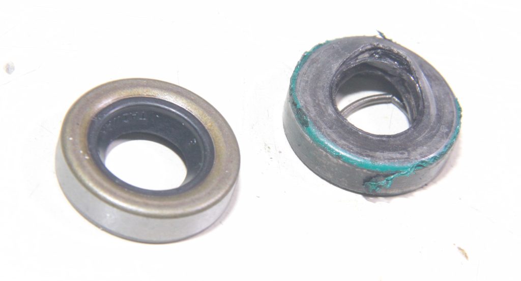 old and new distributor seal side by side comparison