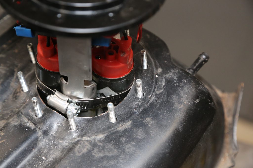 dropping a fuel pump into a car's gas tank