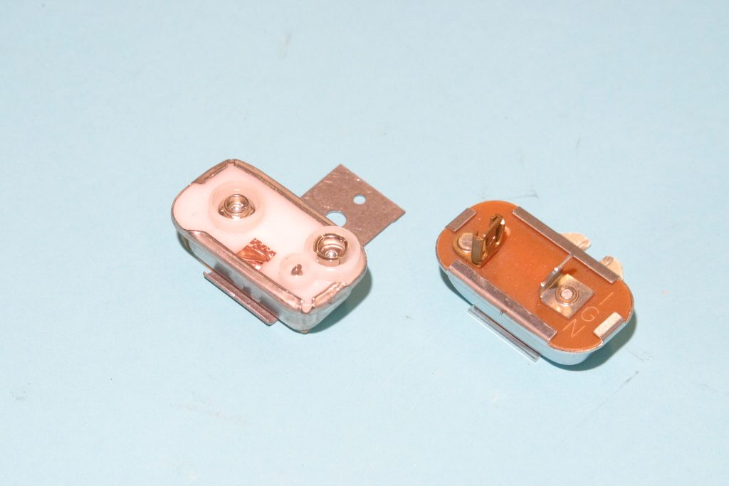 vintage voltage regulators for a vehicle gauge cluster