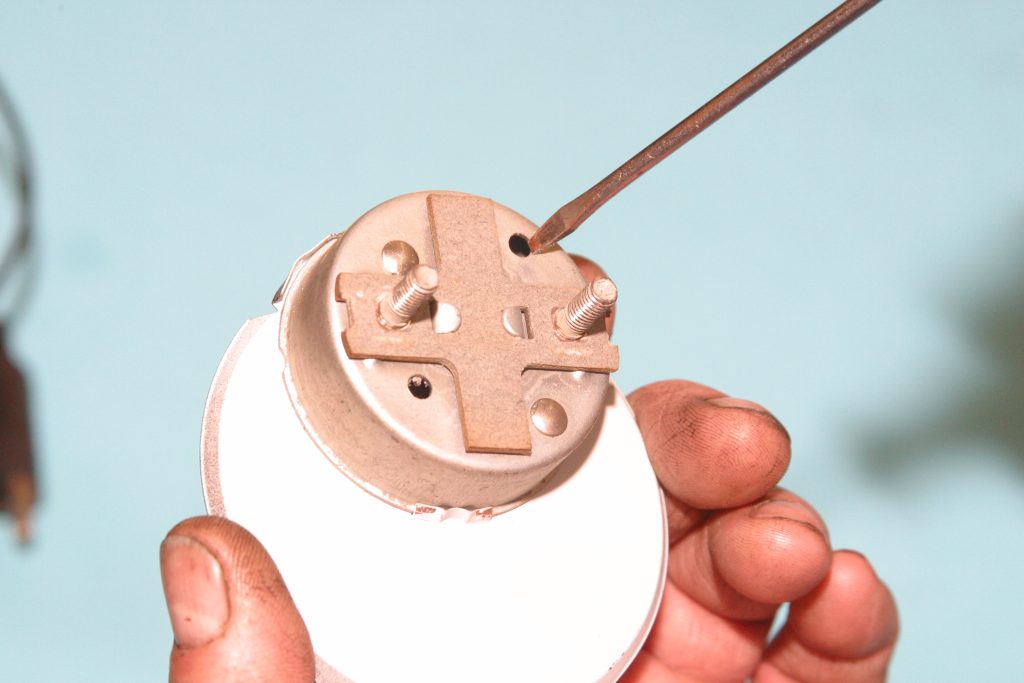 rear view of terminals on a vintage temperature gauge